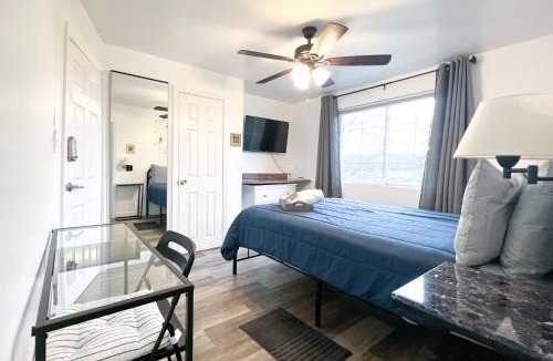 Englewood House | Sunny Queen bedroom feel like home!