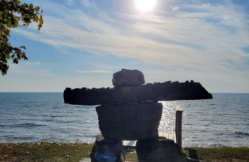 Romney Cottage | SUNRISE BAY has a panoramic view of Lake Erie with a private beach.