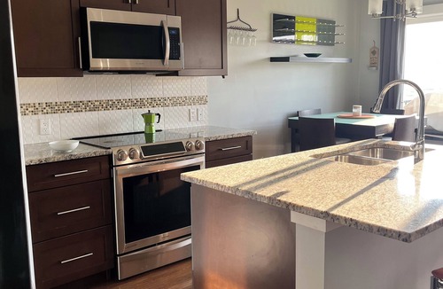 Cochrane House | Sunrise Home with Mountain View/Hot Tub