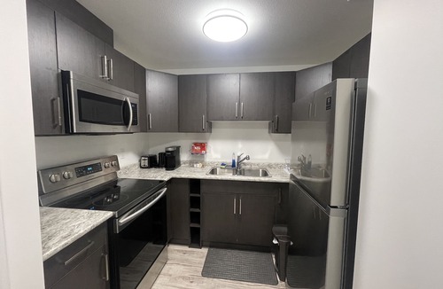 Saskatoon House | Sunset at Prairie Luxury Suite with NE Swale View