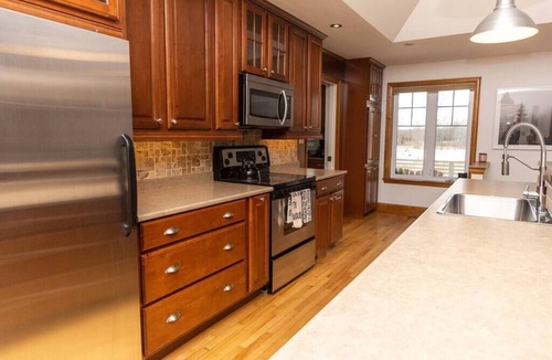 Wellington House | Sunset Beach - Waterfront, Hot Tub, Games Room