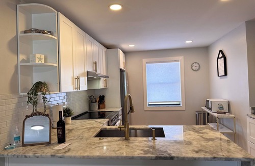 East Lake Woodlands Condo | Sunset Escape Heated Pool : Honeymoon Island Pass + Gated Community