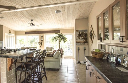 Port Pine Heights House | Sunset Hideaway, Pool home on canal