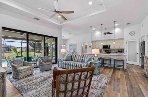 White Marsh House | Sunset Retreat with heated pool
