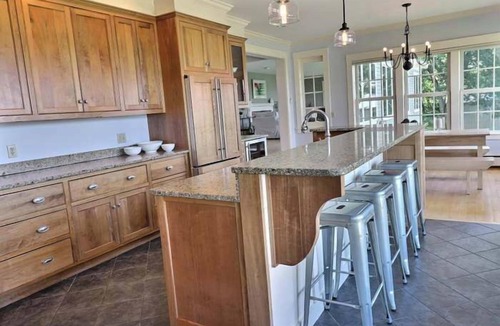 Center Ossipee House | Sunset Slopes: A spacious 4-bedroom home in scenic Wilmot, NH, with garden views.