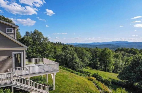 Center Ossipee House | Sunset Slopes: A spacious 4-bedroom home in scenic Wilmot, NH, with garden views.