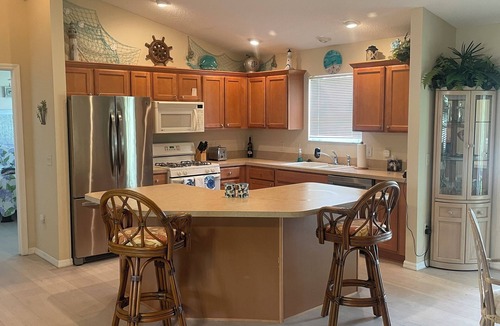 Lynnhaven House | Sunsets on the Sands in the Villages! Golf Front 3/2