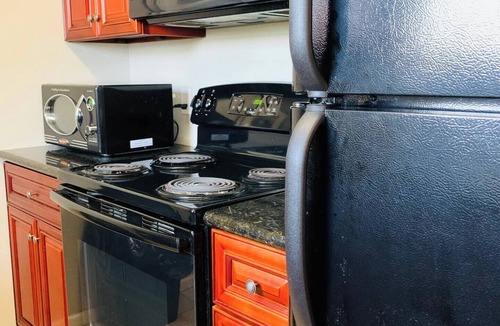 McNair Condo | Sunshine Clean Gated Baytown Save Long Term Stays