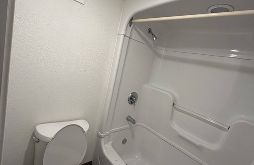 Ferry Pass Hotel | Super 6 Inn & Suites