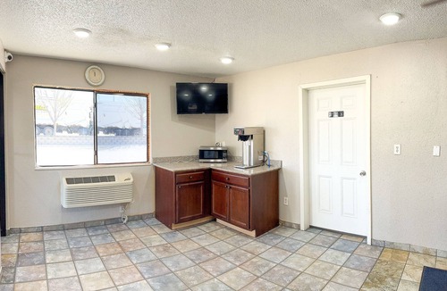 Iowa River Landing Hotel | Super 7 Motel