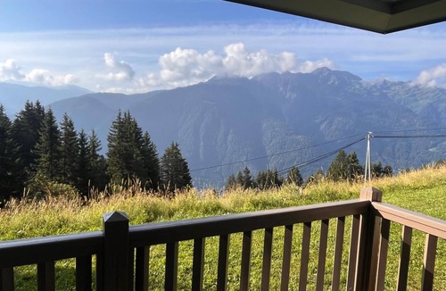 Villard-sur-Doron Apartment | Superb, cozy mountain apartment with shared pool.