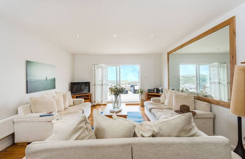 Lusty Glaze Cottage | Surfside, a spacious and beautifully presented beachfront home