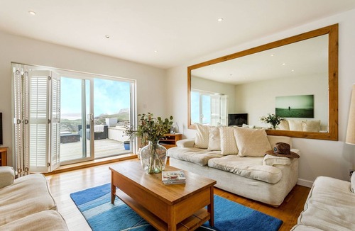 Lusty Glaze Cottage | Surfside, a spacious and beautifully presented beachfront home