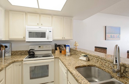 Clearwater Beach Condo | Surfside Condos 202 Beachfront Oasis with Heated Pool