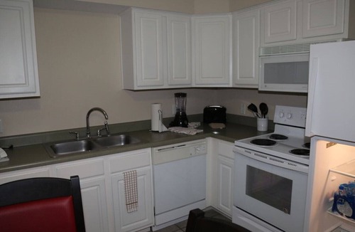 Branson Condo | Surrey Grand Crowne condo room next to golf course in Branson MO!