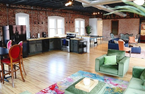 Bartlesville Apartment | Swanky downtown Loft fit for a king! History and Luxury for a perfect getaway