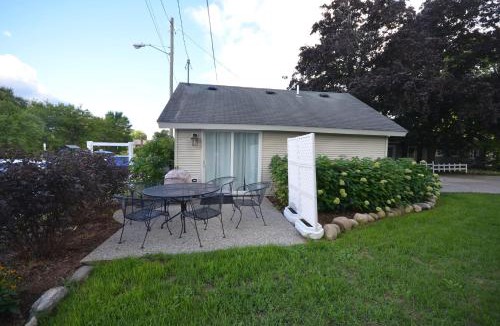 Suttons Bay House | Sweet Cherry "Coral Shutter"