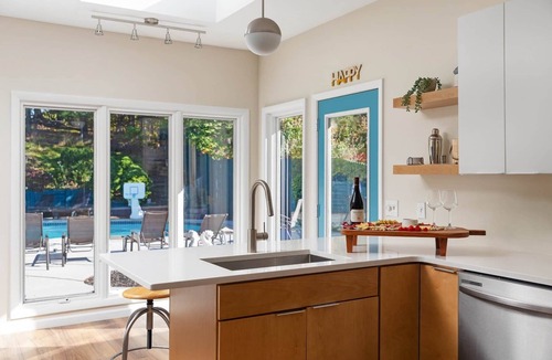 Norton Shores House | Swimming in the Woods