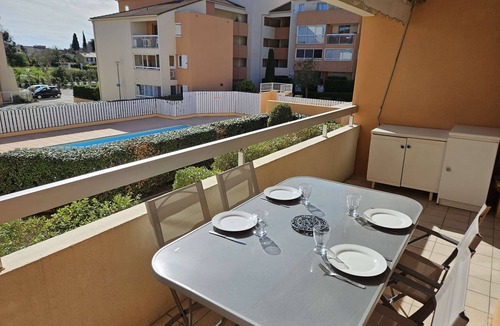 Tamaris Apartment | Swimming pool, balcony, facing south, sleeps 4.