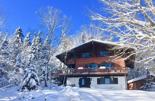Sainte-Agathe-des-Monts Ski Chalet | Swiss Chalet with Real Two Story Stone Fireplace