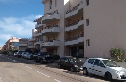 Calvi Apartment | T1 standing entrance of CALVI