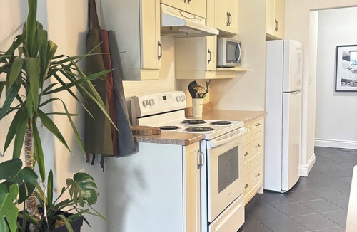 Greater Napanee Apartment | Tackle Box Retreat: Waterfront Escape with Fishing, Spa, Sauna, Pool & Gym