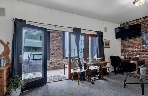 New Tacoma Condo | Tacoma's Theater District Charming Studio with Deck! Third floor condo.
