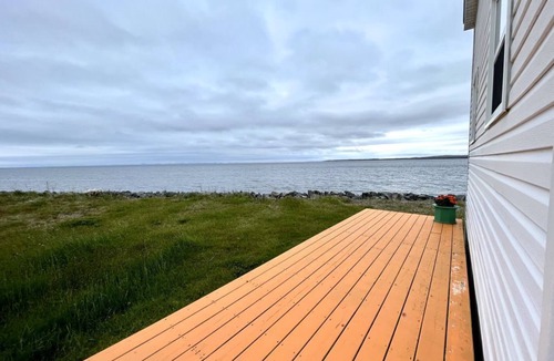 Grand Beach Cabin | Take it easy at this tranquil getaway, only steps from the beach!