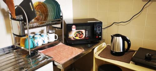 Si Rusa Apartment | Tanjung Tuan Beach Regency - Hermis Theme 1 Car Park