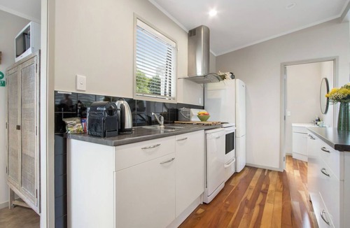 Waihi Beach Cottage | Te Mahana Cottage - pool & private spa, beachfront