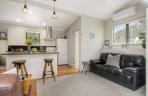 Waihi Beach Cottage | Te Mahana Cottage - pool & private spa, beachfront