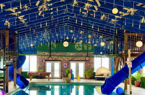 Bryant House | TeePee at Paradise Point with a hot tub fire pit & grill