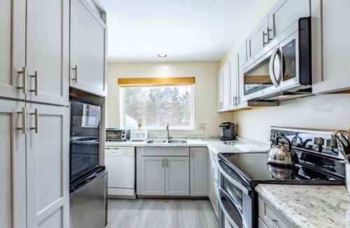 Jeffersonville Condo | TELEMARK 5 (4-Bedroom Condo) with Pool by RedAwning