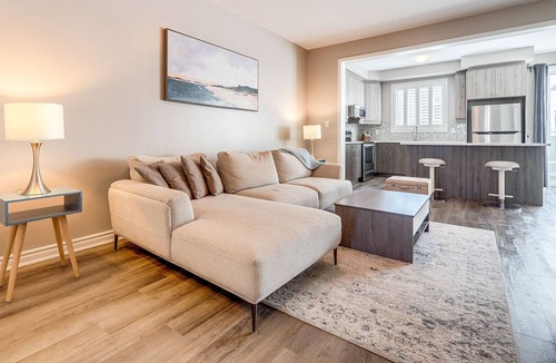 Milton House | "Temporary Tranquility Awaits: 3-Bedroom Townhome in Milton, Ontario
