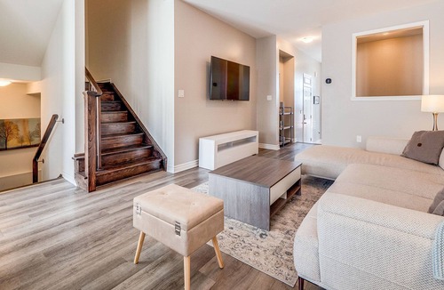 Milton House | "Temporary Tranquility Awaits: 3-Bedroom Townhome in Milton, Ontario