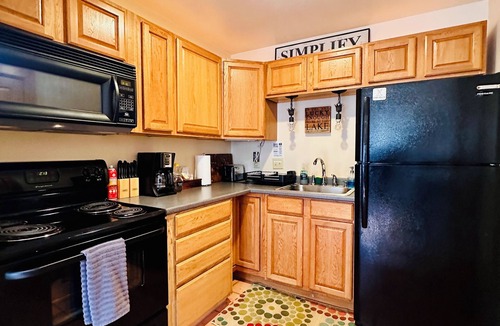 Sylvan Shores Cabin | Terrace - lakefront, hot tub, full kitchen, BBQ, screened in porch, two patios.