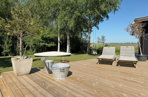 Or House | Terrace with sunrise over Isefjord on Orø