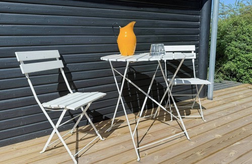 Or House | Terrace with sunrise over Isefjord on Orø