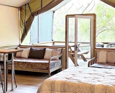 Sutherland Springs House | Texas Waterside Escape: Glamping Holiday in a Tented Cabin with Shared Comforts