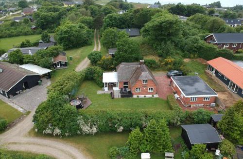 Remmer Strand House | Thatched Holiday Home in Struer, Jutland with a view