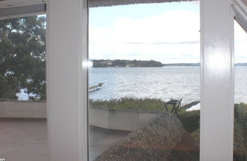 Bjert House | Thatched-roof house in secluded location with roof terrace on the Baltic Sea with outdoor whirlpool