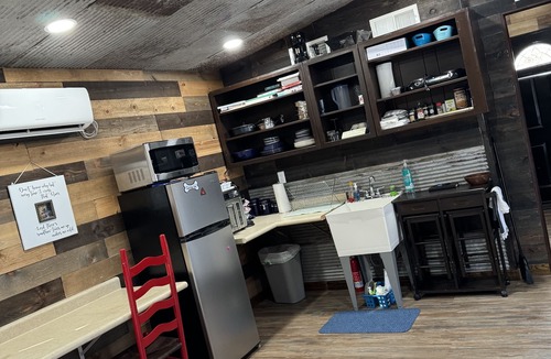 Pineville Cabin | The Adventure Center rustic tiny cabin hot tub access stage stars sunsets & pets