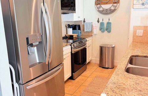 Red Fish Cove Condo | The Beach Pad: Bayside Serenity with Unforgettable Views. Pet-Friendly!
