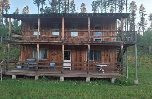 Blue House | The Beaver Creek Guest Ranch offers a peaceful setting for guests to relax.