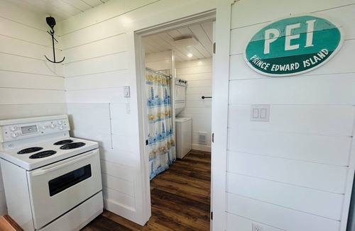 Malpeque Cottage | The Blue Buoy- Hot tub, King bed, Centrally located, stunning views.