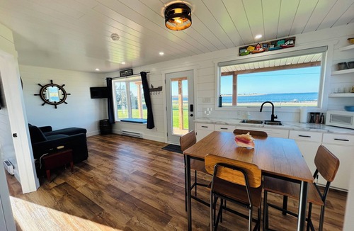 Malpeque Cottage | The Blue Buoy- Hot tub, King bed, Centrally located, stunning views.