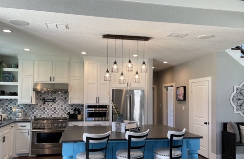 Tyler House | The Blue House on Two Lakes