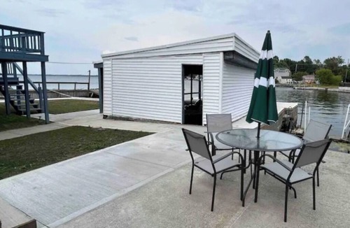 Dexter House | The Boathouse: Peaceful lakefront home with protective boathouse.