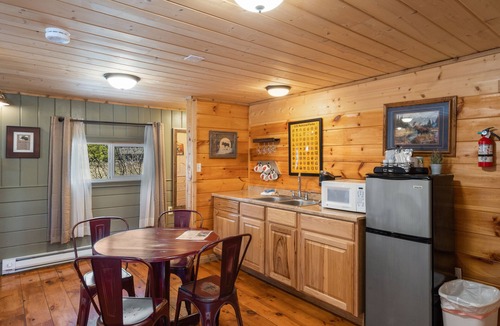 West Yellowstone Hotel | The Bucking Moose Wolf Suite: Cozy 2 Queen suite, just 1 minute from Yellowstone!