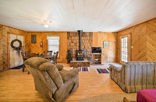 Bellevue Apartment | 'The Burgundy Cabin' Iowa Retreat: Pond & Fire Pit
